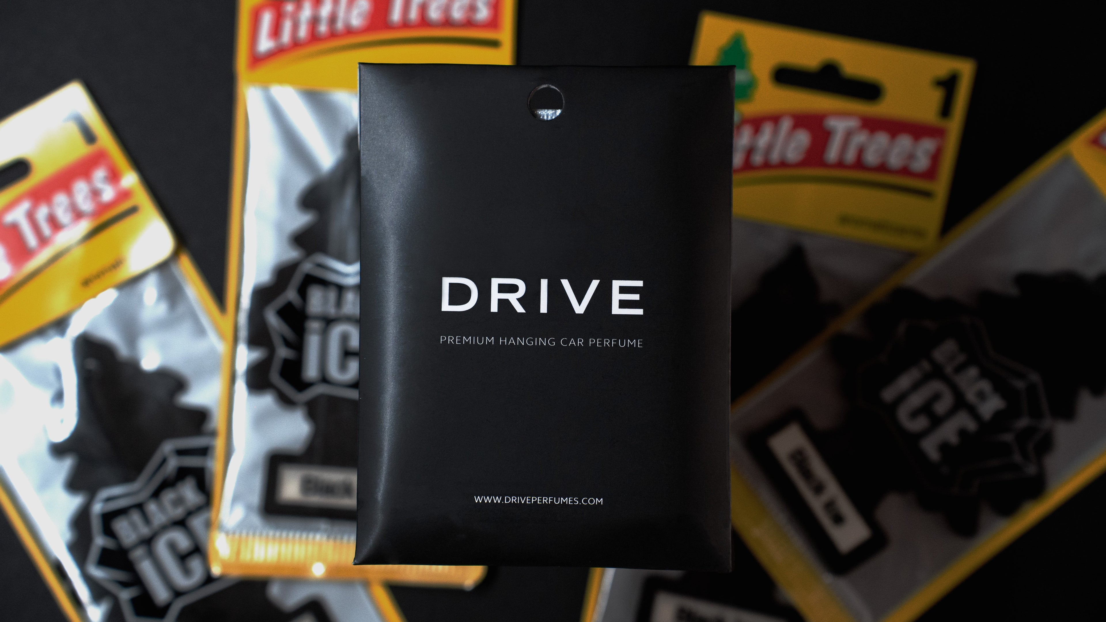 Hanging Car Perfume vs. Little Trees: What Actually Lasts Longer