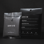 Front and back of a black Drive car perfume envelope
