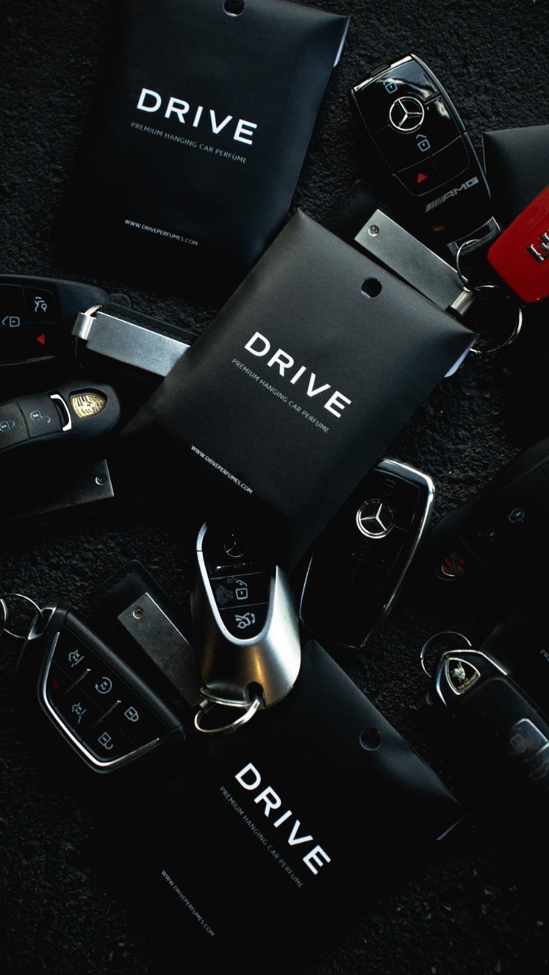 Drive car perfume envelopes among luxury car keys